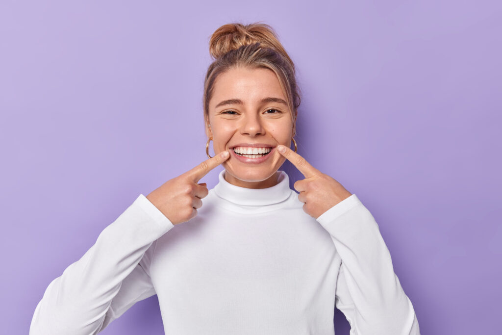 Bright white smile after professional teeth whitening treatment