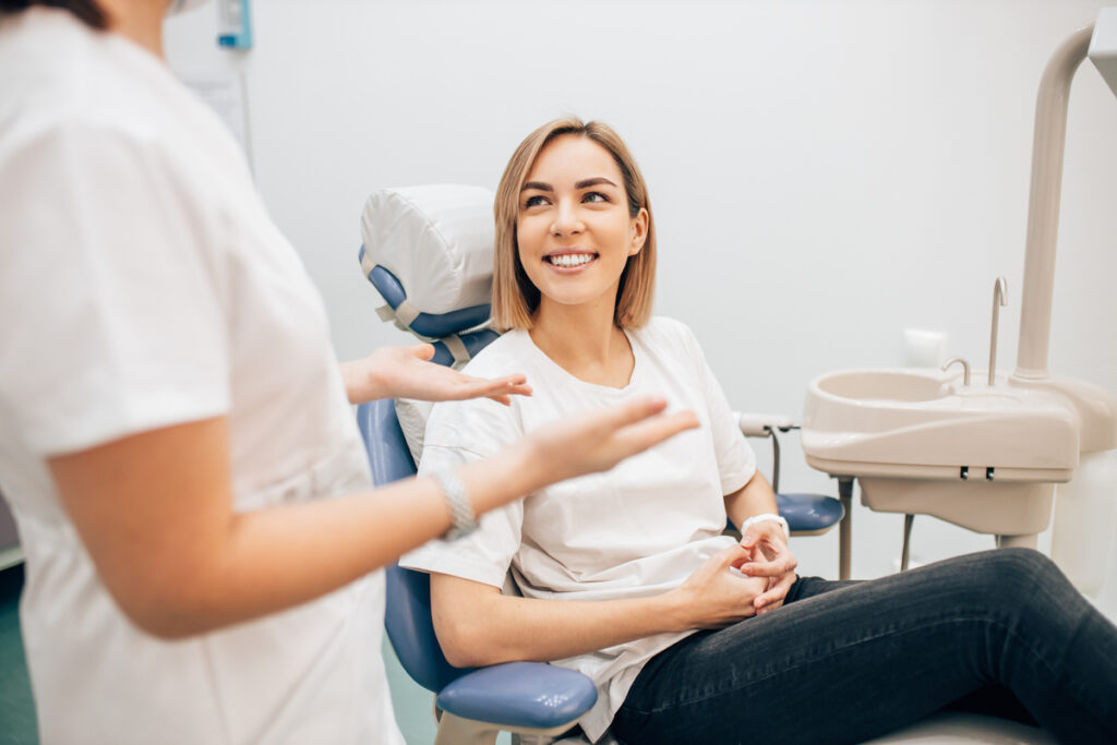 young charming lady sit in dentist office